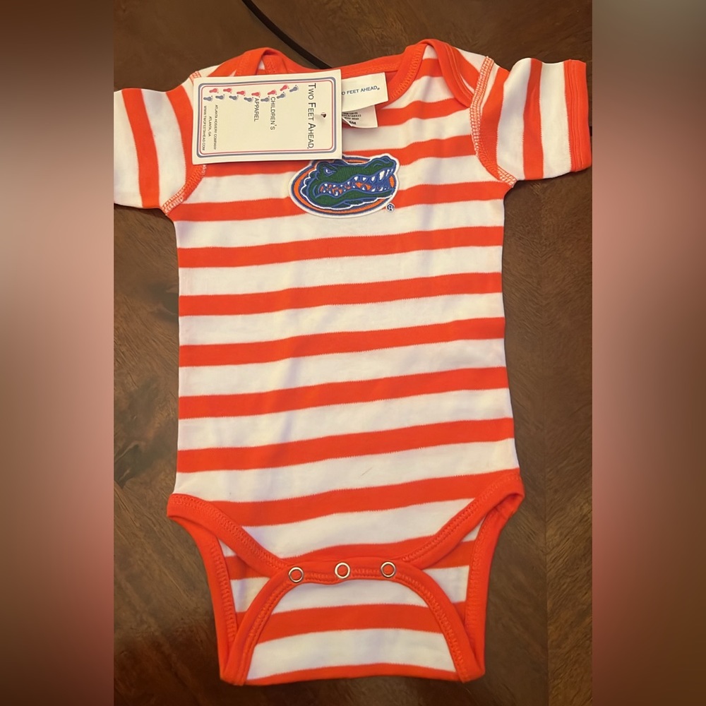 NWT Florida gators onesies sz 6 mos